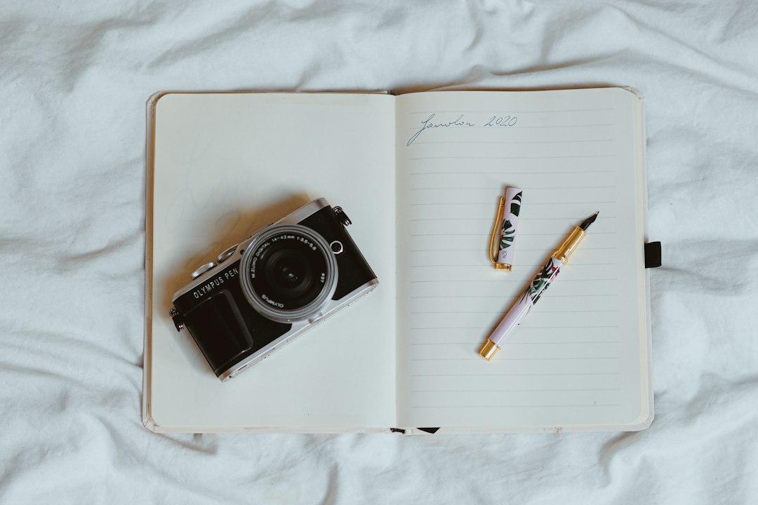 black and silver point and shoot camera