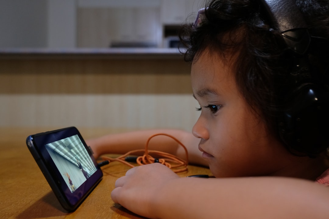 girl using black android smartphone