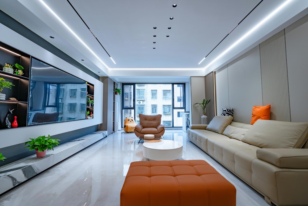 Modern living room with sectional sofa and large window