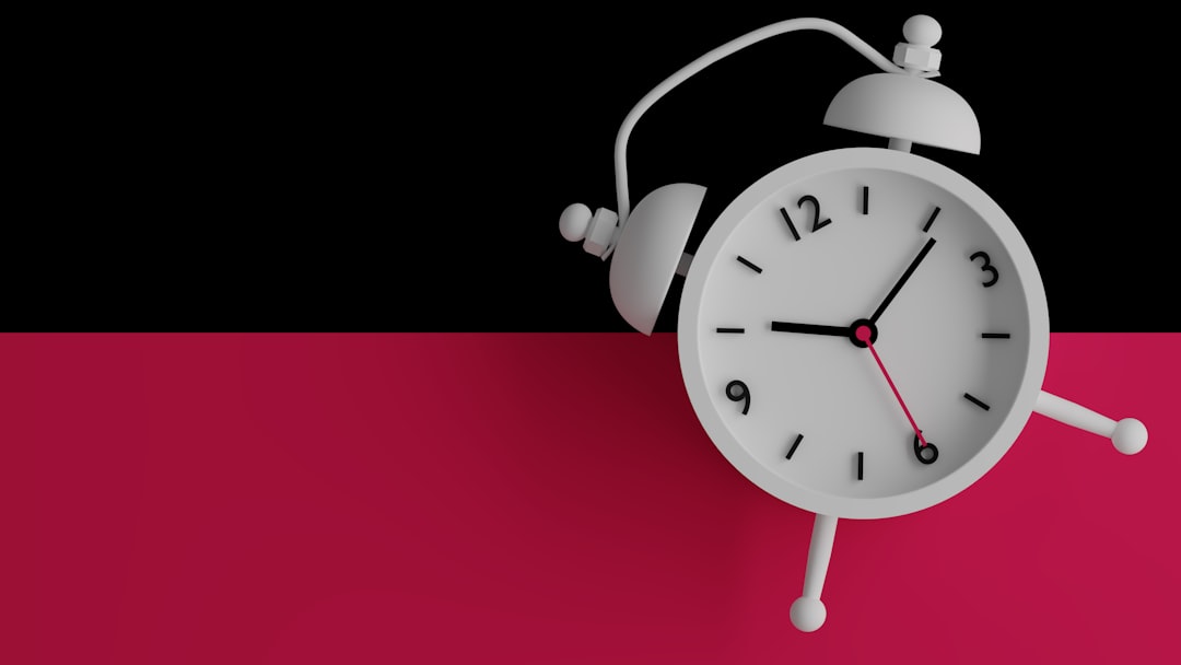 a white clock with a white face