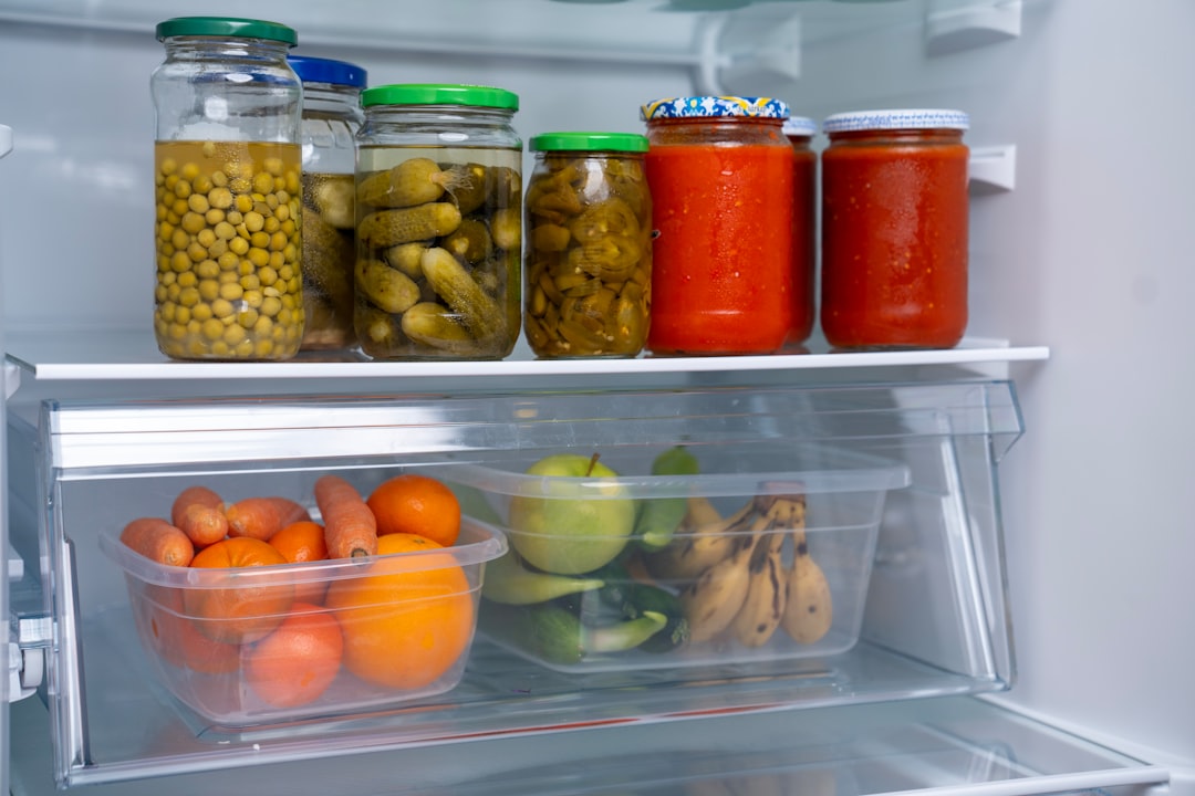 A refrigerator filled with lots of food and condiments