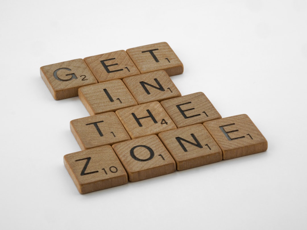 a scrabble of words that spell out get in the zone